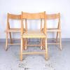 1 of 2 Retro folding chairs with rattan seat Italy 70s Mid-century wooden furniture