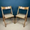 Pair of folding chairs with rattan seat Italy 1980s Mid-century wooden furniture