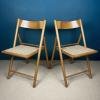 Pair of folding chairs with rattan seat Italy 1980s Mid-century wooden furniture